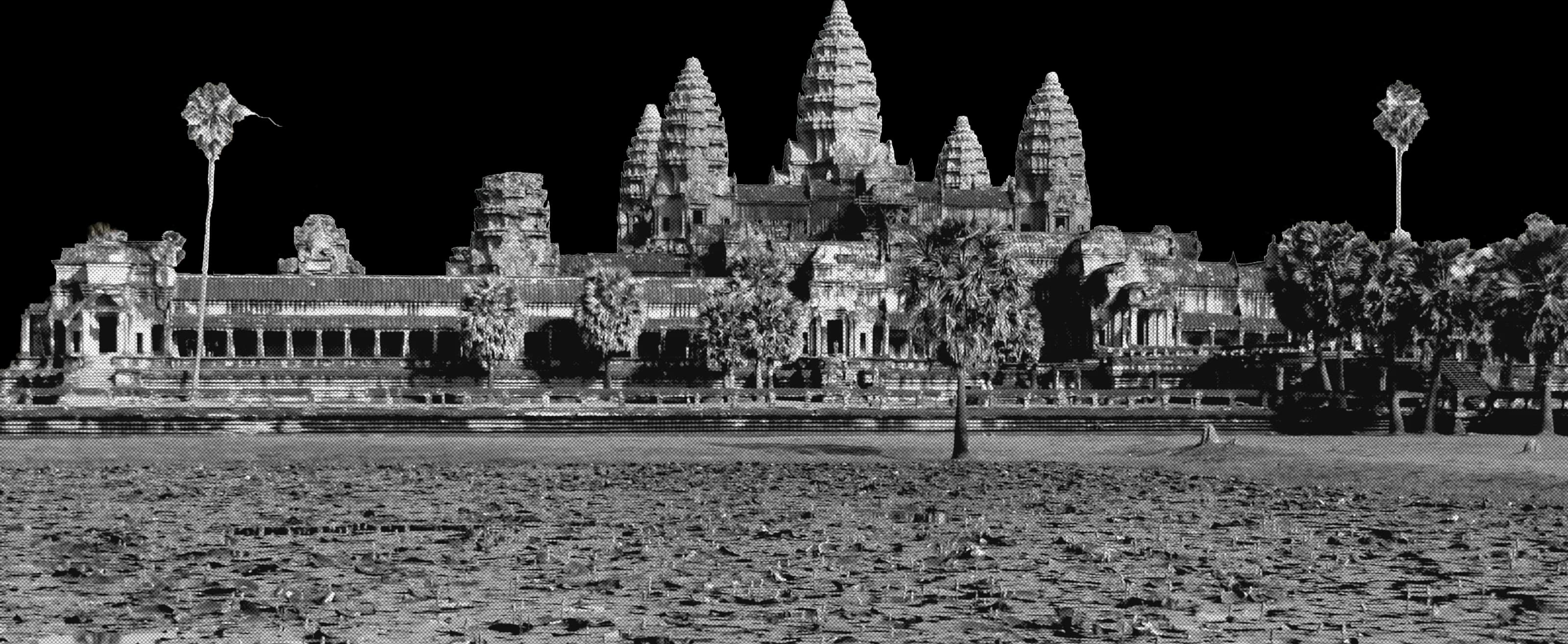 Angkor Wat’s five towers above its galleries, across a dry moat, in black and white