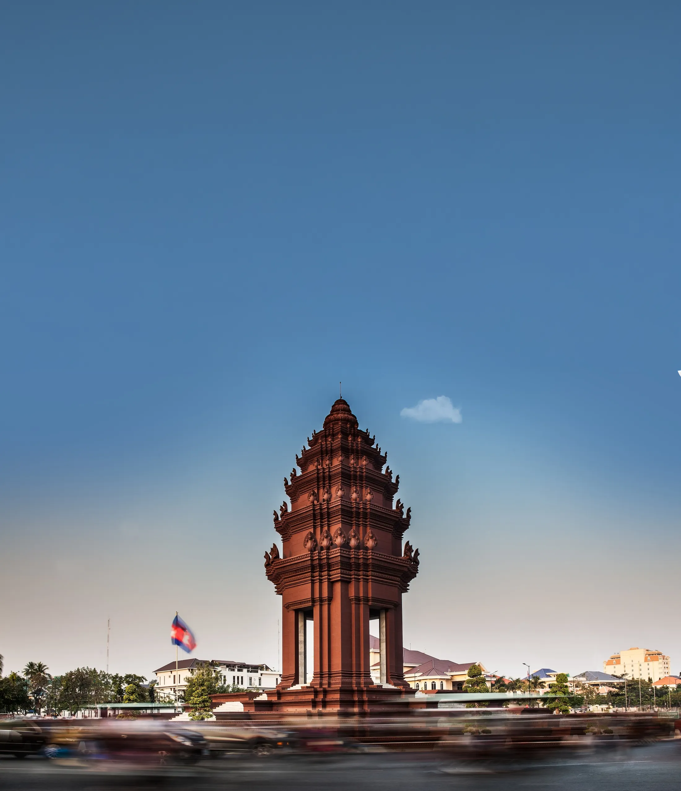 The Independence Monument in Phnom Penh, with traffic streaming past it