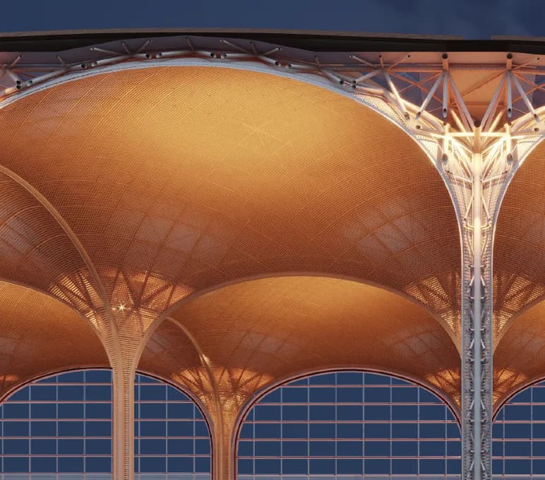 Vaulted roof canopies lit from below at dusk