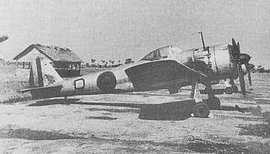 A single-engine military aircraft on the airfield