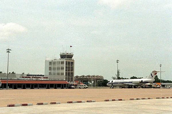 The terminal and control tower across the apron