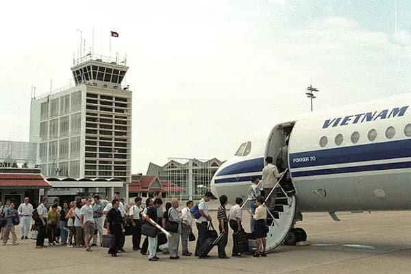 Passengers boarding a Vietnam Airlines aircraft