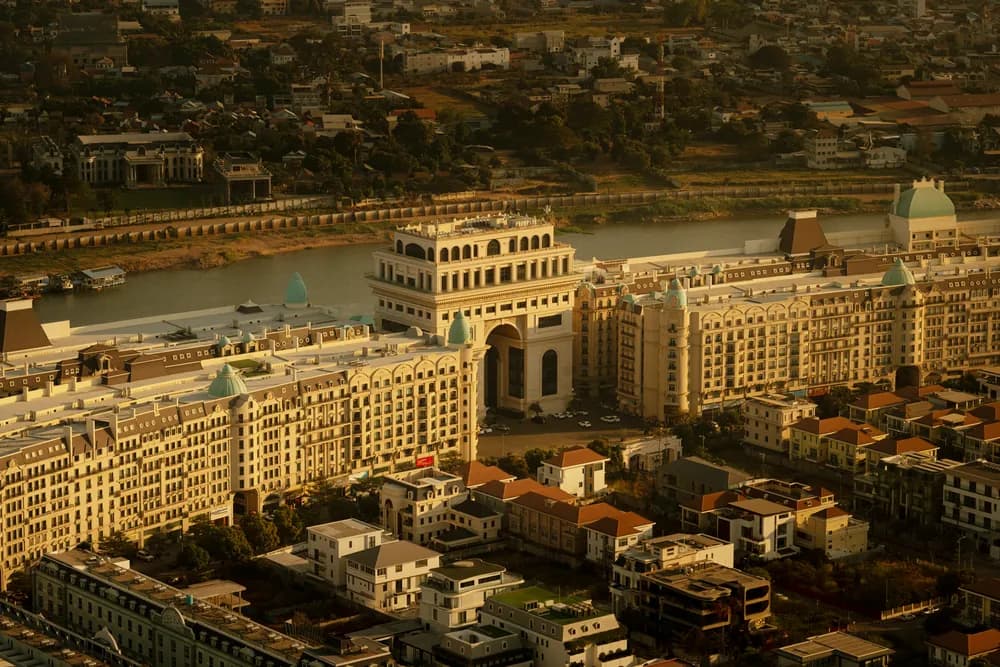 Rows of buildings in the warm evening light, seen from above