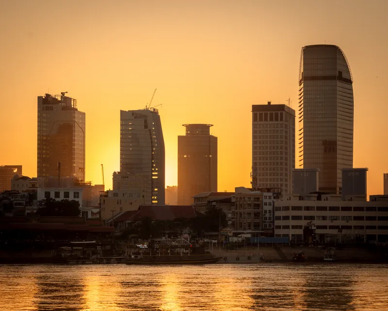 Phnom Penh’s towers against the setting sun
